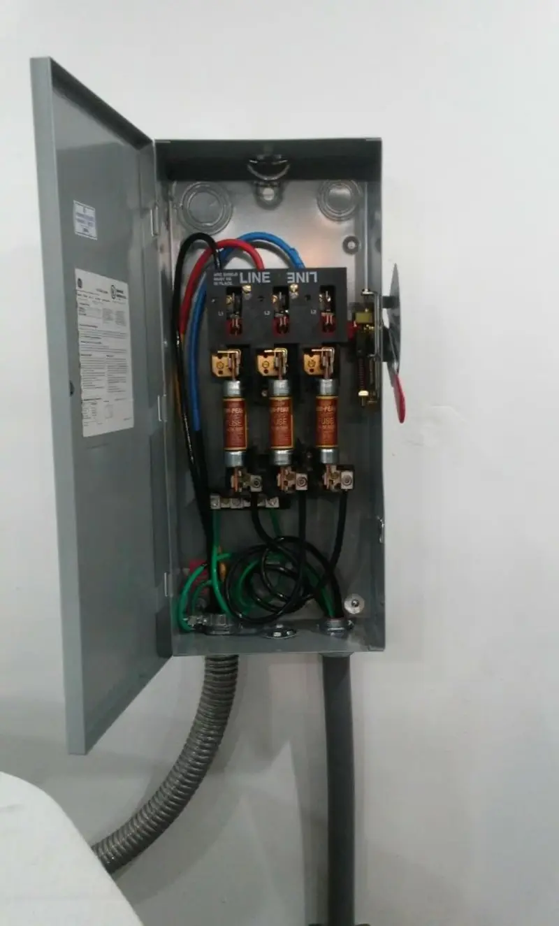 Three-phase disconnect switch installed for Smoke Detector Installation in The Village